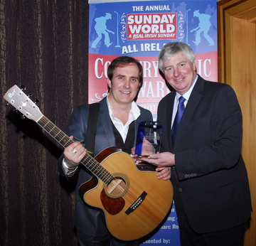 Marc Roberts being presented his 2012 Award by Michael Lester